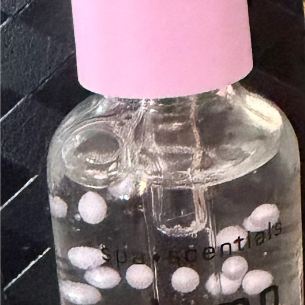Pink and Clear Bottle with White Accents